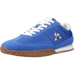 Buty LE COQ SPORTIF VELOCE I Niebieski. Niebieskie buty trekkingowe męskie le coq sportif, bez wzorów, ze skóry, bez zapięcia, trekkingowe. Za 316.99 zł.