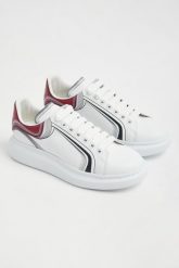 Sneakersy męskie skórzane ALEXANDER MCQUEEN. Buty sportowe na co dzień męskie ALEXANDER MCQUEEN, m, bez wzorów, bez ramiączek, bez kaptura. W wyprzedaży za 2,771.30 zł.