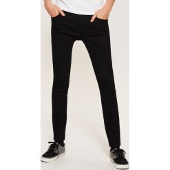 Jeansy super skinny - Czarny. Czarne jeansy męskie House, z jeansu. Za 89.99 zł.