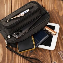 Paolo Peruzzi Saszetka męska czarna skórzana do ręki vintage T-130-HBL. Czarne saszetki męskie Paolo Peruzzi, bez wzorów. Za 178.58 zł.