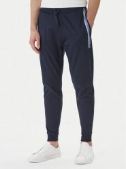 BOSS Spodnie dresowe Authentic 50554784 Granatowy Regular Fit. Niebieskie spodnie dresowe męskie Boss, bez wzorów, z bawełny. Za 379.99 zł.
