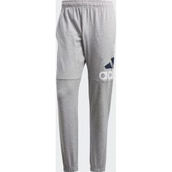 Adidas Spodnie ESS Logo T P SJ Szary r. XL (BK7409). Długie spodnie sportowe męskie marki ADIDAS. Za 135.45 zł.