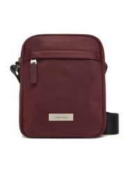 Calvin Klein Saszetka Sleek Reporter LV04D3180G Bordowy. Czerwone saszetki męskie Calvin Klein, bez wzorów, z materiału. Za 299.99 zł.