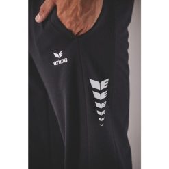 Spodnie dresowe Erima Cmpt Wings Gk czarne. Czarne spodnie dresowe męskie Erima, bez wzorów, z dresówki. Za 318.99 zł.