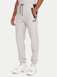 Reebok Spodnie dresowe RK25145CCM Szary Regular Fit. Szare spodnie dresowe męskie Reebok, bez wzorów, z dresówki. Za 299.99 zł.