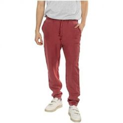 Spodnie sportowe męskie Champion Elastic Cuff. Czerwone szorty sportowe męskie CHAMPION, bez wzorów, z dresówki, sportowe. Za 243.00 zł.