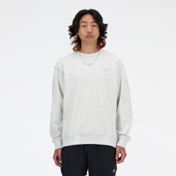 Bluza męska New Balance MT41506AHH – szara. Szare bluzy nierozpinane męskie New Balance, m, z aplikacjami, z bawełny, klasyczne, bez ramiączek, bez kaptura. Za 359.99 zł.