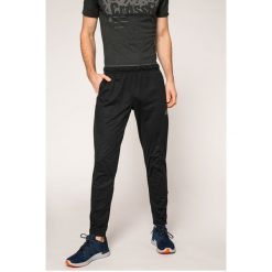 Reebok - Spodnie Wor Sl Trckstr. Długie spodnie sportowe męskie marki Reebok. W wyprzedaży za 139.90 zł.