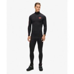 Legginsy podstawowe do narciarstwa. Czarne legginsy męskie Superdry., m, bez wzorów, narciarskie. W wyprzedaży za 185.90 zł.