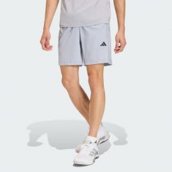 Tkane Szorty Do Ćwiczeń Essentials Base. Szare szorty sportowe męskie ADIDAS, bez wzorów, sportowe. Za 119.00 zł.