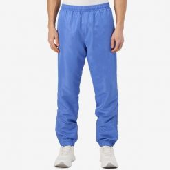 Spodnie Kappa Krismano. Niebieskie spodnie na co dzień męskie Kappa, bez wzorów, z dresówki, casualowe. Za 207.50 zł.