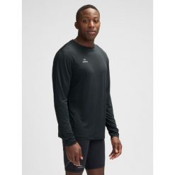 Dżersej z długim rękawem Newline Beat. Czarne koszulki męskie z długim rękawem Newline, bez wzorów, z dżerseju, sportowe, bez kołnierzyka, bez ramiączek. Za 186.00 zł.