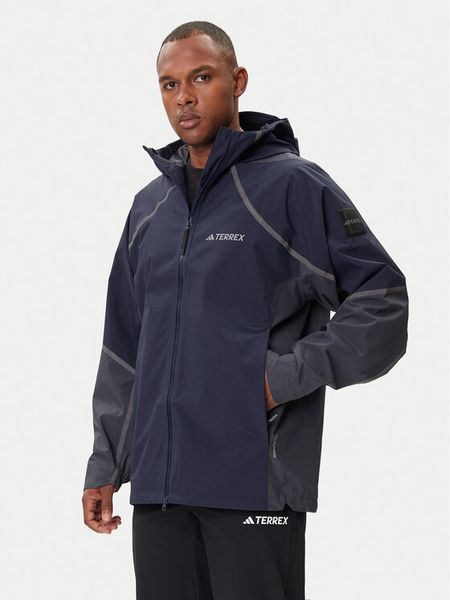 Adidas Kurtka przeciwdeszczowa Nat Geo Climaproof KC2343 Granatowy Loose Fit. Niebieskie kurtki outdoor męskie ADIDAS, m, bez wzorów, z syntetyku, bez kaptura, outdoorowe, ClimaProof (Adidas). Za 539.99 zł.