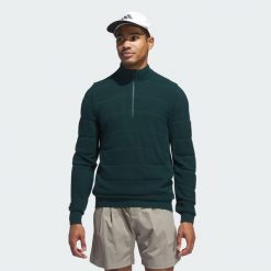 Sweter Ultimate365 Tour Wind Knit Quarter-Zip. Zielone swetry męskie ADIDAS, bez wzorów, sportowe, bez kołnierzyka, bez ramiączek. W wyprzedaży za 519.35 zł.