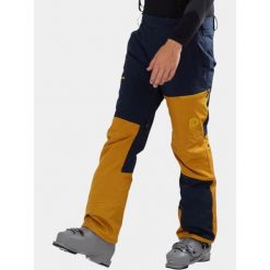 Spodnie Narciarskie Męskie Fundango Teak Colourblock. Niebieskie spodnie narciarskie i snowboardowe męskie Fundango, bez wzorów, narciarskie. W wyprzedaży za 499.00 zł.