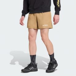 Szorty Terrex Multi. Brązowe szorty sportowe męskie ADIDAS, bez wzorów, sportowe. W wyprzedaży za 142.35 zł.