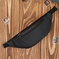 Saszetka nerka męska skórzana na pas czarna skóra naturalna Abruzzo ABR-51. Czarne saszetki męskie z aplikacjami, z materiału. Za 84.00 zł.