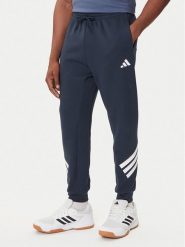Adidas Spodnie dresowe Future Icons 3-Stripes JW7088 Granatowy Regular Fit. Niebieskie spodnie dresowe męskie ADIDAS, bez wzorów, z bawełny. Za 209.99 zł.