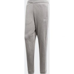 Adidas Spodnie męskie 3 Stripes szare r. XL (CY4569). Szare spodnie dresowe męskie marki ADIDAS. Za 230.68 zł.