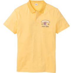 Shirt polo z nadrukiem bonprix żółty. Żółte koszulki polo męskie bonprix, m, bez wzorów, bez kołnierzyka, bez ramiączek. Za 27.99 zł.