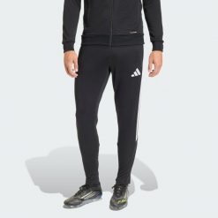 Spodnie treningowe Tiro 26 League. Białe długie spodnie sportowe męskie ADIDAS, bez wzorów. Za 219.00 zł.