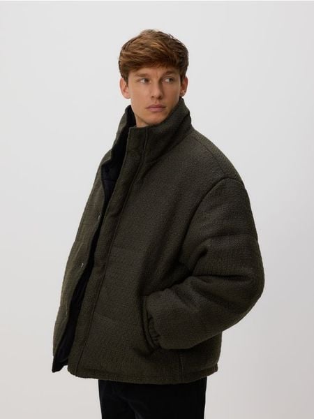 Pikowana dwustronna kurtka - ciemnozielony. Zielone kurtki męskie Reserved, l, bez wzorów, z tkaniny, bez ramiączek, bez kaptura. Za 359.99 zł.