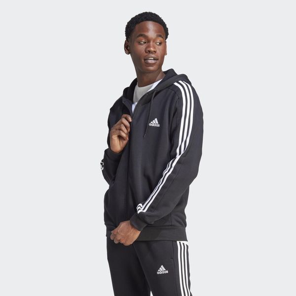 Bluza z kapturem Essentials Fleece 3-Stripes Full-Zip. Czarne bluzy nierozpinane męskie ADIDAS, s, bez wzorów, z bawełny, sportowe, bez ramiączek, z kapturem. Za 229.00 zł.