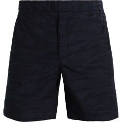 Uniforms for the Dedicated CASUAL Szorty dark navy jaquard. Niebieskie szorty męskie marki Uniforms for the Dedicated, z bawełny, casualowe. W wyprzedaży za 345.95 zł.