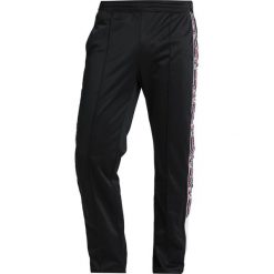 Champion Reverse Weave SPECIAL SEMI DULL Spodnie treningowe black. Czarne długie spodnie sportowe męskie Champion Reverse Weave, z dresówki. Za 359.00 zł.