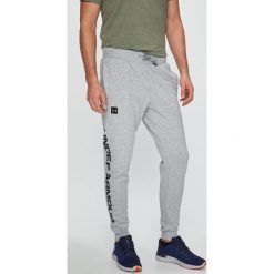 Under Armour - Spodnie Rival. Długie spodnie sportowe męskie Under Armour. W wyprzedaży za 179.90 zł.