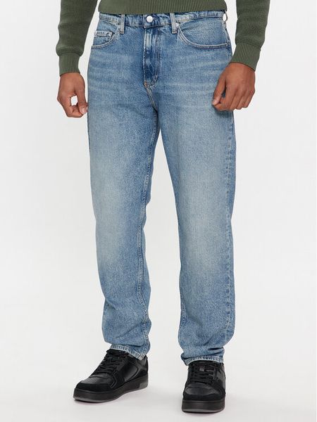 Calvin Klein Jeans Jeansy Regular Taper J30J324556 Niebieski Regular Fit. Niebieskie jeansy męskie Calvin Klein Jeans, bez wzorów, z bawełny. Za 279.99 zł.