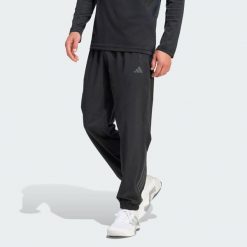 Spodnie Dresowe Tech Essentials Workout. Czarne spodnie dresowe męskie ADIDAS, bez wzorów, z dresówki. Za 279.00 zł.