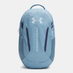 Plecak Under Armour Hustle 6.0. Niebieskie plecaki męskie Under Armour, bez wzorów, z materiału. Za 209.99 zł.