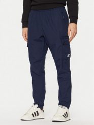Adidas Spodnie dresowe Trefoil Essentials Woven Cargo JD2454 Granatowy Regular Fit. Niebieskie spodnie dresowe męskie ADIDAS, bez wzorów, z dresówki. Za 209.99 zł.