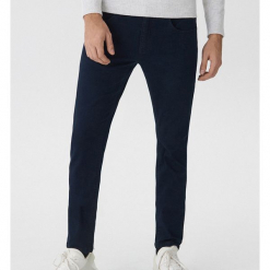 Ocieplane jeansy slim fit - Granatowy. Niebieskie jeansy męskie House, z jeansu. Za 129.99 zł.