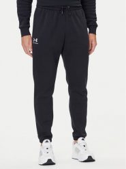 Under Armour Spodnie dresowe UA Essential Fleece Jogger 1373882 Czarny Regular Fit. Czarne spodnie dresowe męskie Under Armour, bez wzorów, z bawełny. Za 239.99 zł.