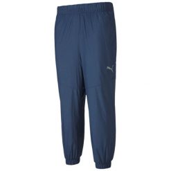 Puma Męskie spodnie Reactive Woven S – DRYCELL. Fioletowe spodnie dresowe męskie Puma, bez wzorów, z dresówki. Za 253.99 zł.