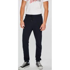 Trussardi Jeans - Spodnie. Szare spodnie na co dzień męskie TRUSSARDI JEANS, z bawełny, casualowe. W wyprzedaży za 279.90 zł.
