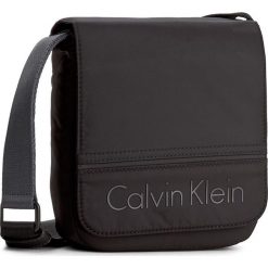 Saszetka CALVIN KLEIN - Matthew Reporter Wi K50K502894 001. Saszetki męskie marki Calvin Klein. W wyprzedaży za 229.00 zł.