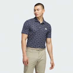 Koszulka polo ULTIMATE365 MESH PRINT CLIMACOOL. Niebieskie koszulki polo męskie ADIDAS, m, bez wzorów, z meshu, eleganckie, bez kołnierzyka, bez ramiączek. Za 299.00 zł.