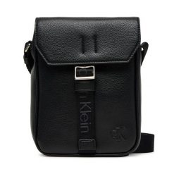 Saszetka Calvin Klein. Czarne saszetki męskie Calvin Klein, bez wzorów, małe. Za 249.99 zł.