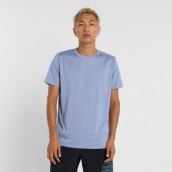 Koszulka męska New Balance MT41222DUS – niebieska. Niebieskie t-shirty sportowe męskie New Balance, m, bez wzorów, z materiału, sportowe, bez ramiączek. Za 99.99 zł.
