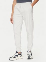 Tommy Hilfiger Spodnie dresowe UM0UM03348 Beżowy Regular Fit. Brązowe spodnie dresowe męskie Tommy Hilfiger, bez wzorów, z dresówki. Za 219.99 zł.