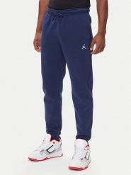 Nike Spodnie dresowe FV7277 410 Granatowy Regular Fit. Niebieskie spodnie dresowe męskie Nike, bez wzorów, z bawełny. Za 309.99 zł.