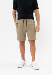 Szorty dresowe ze strukturą M-JANI. Brązowe szorty sportowe męskie Volcano, bez wzorów, z bawełny, klasyczne. Za 89.99 zł.