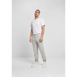 Spodnie Urban Classics basic. Szare spodnie na co dzień męskie Urban Classics, bez wzorów, z dresówki, sportowe. Za 198.00 zł.