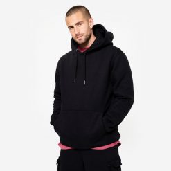 Bluza z kapturem męska Domyos Gym & Pilates. Czarne bluzy nierozpinane męskie DOMYOS, m, bez wzorów, z bawełny, sportowe, bez ramiączek, z kapturem. Za 129.99 zł.