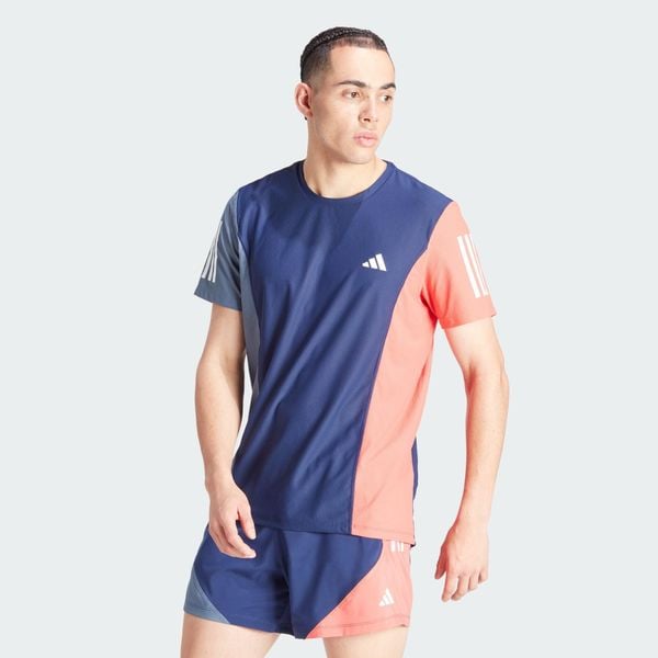 Koszulka Own The Run Colorblock. Czerwone buty do biegania męskie ADIDAS, bez wzorów, z materiału, bez zapięcia, do biegania. W wyprzedaży za 160.80 zł.