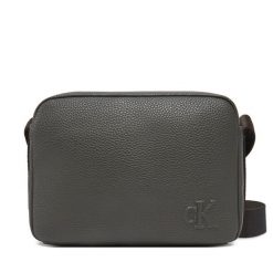 Saszetka Calvin Klein Jeans. Brązowe saszetki męskie Calvin Klein Jeans, bez wzorów, z jeansu, młodzieżowe, małe. Za 239.99 zł.