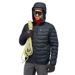 Kurtka z kapturem Haglöfs ROC Flash Down. Czarne kurtki męskie Haglöfs, bez wzorów, z puchu, sportowe, bez ramiączek, z kapturem. W wyprzedaży za 1,054.25 zł.